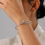 دستبند طلا النگویی میخی نقره ای